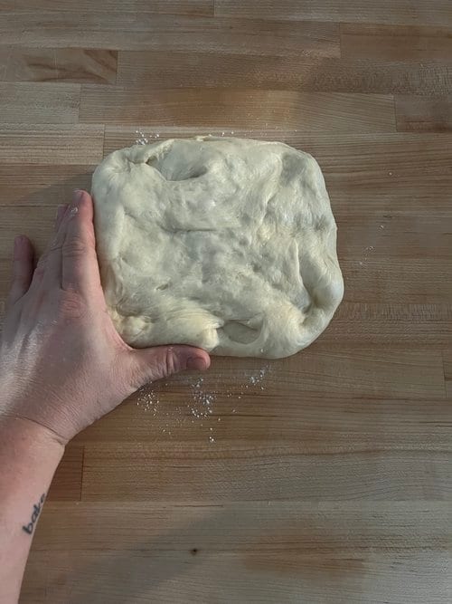 Dough after mixing, smooth and coming off the bowl