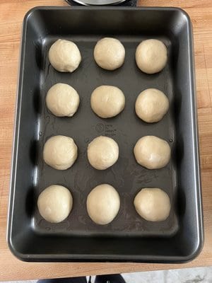 Twelve rolls shaped and in the pan