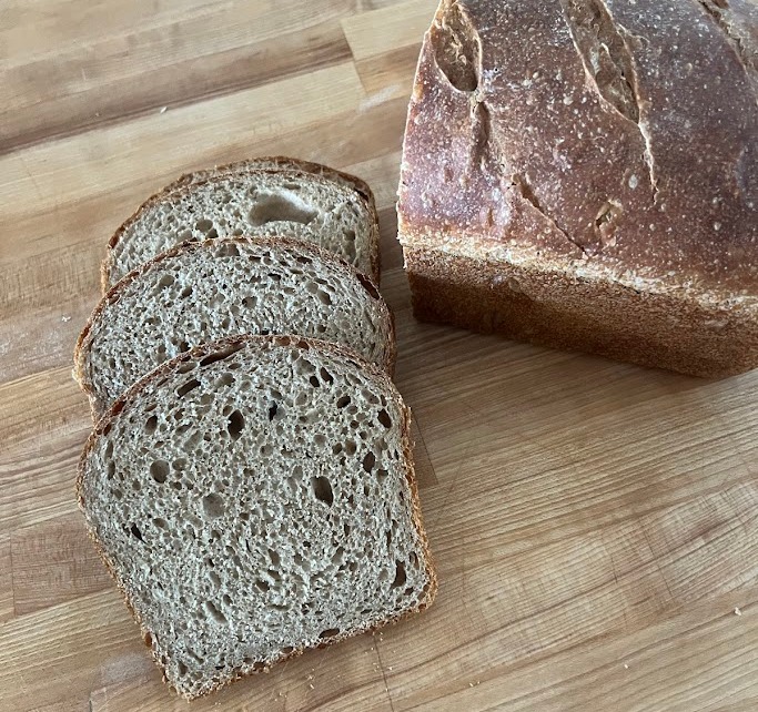 3 slices of sandwich bread next to the cut up loaf