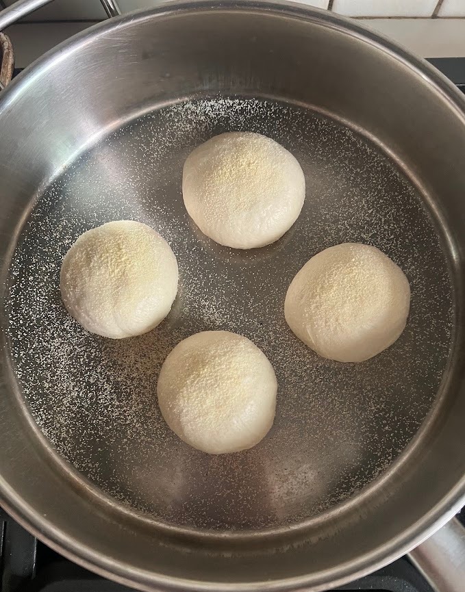 My cast iron is my preferred baking surface but I tried both and they both work well!