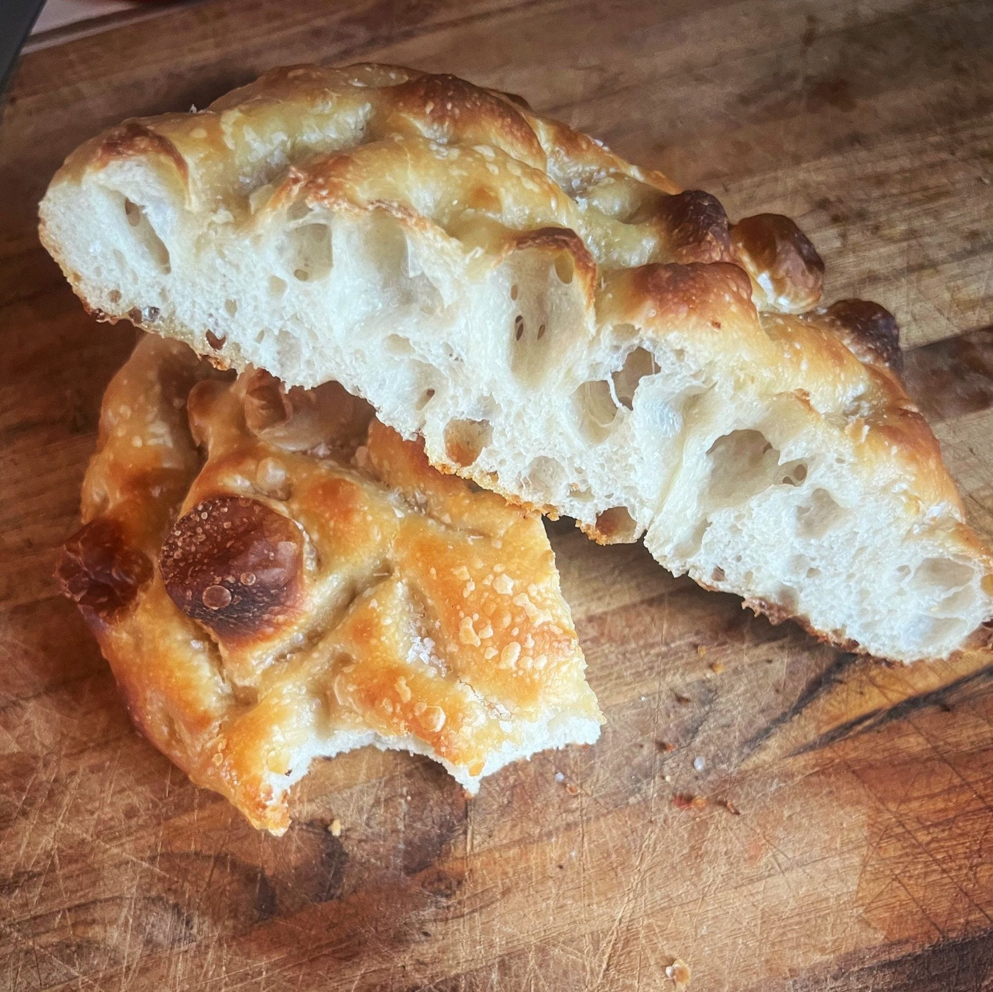 Sourdough focaccia with dimpled olive oil crust